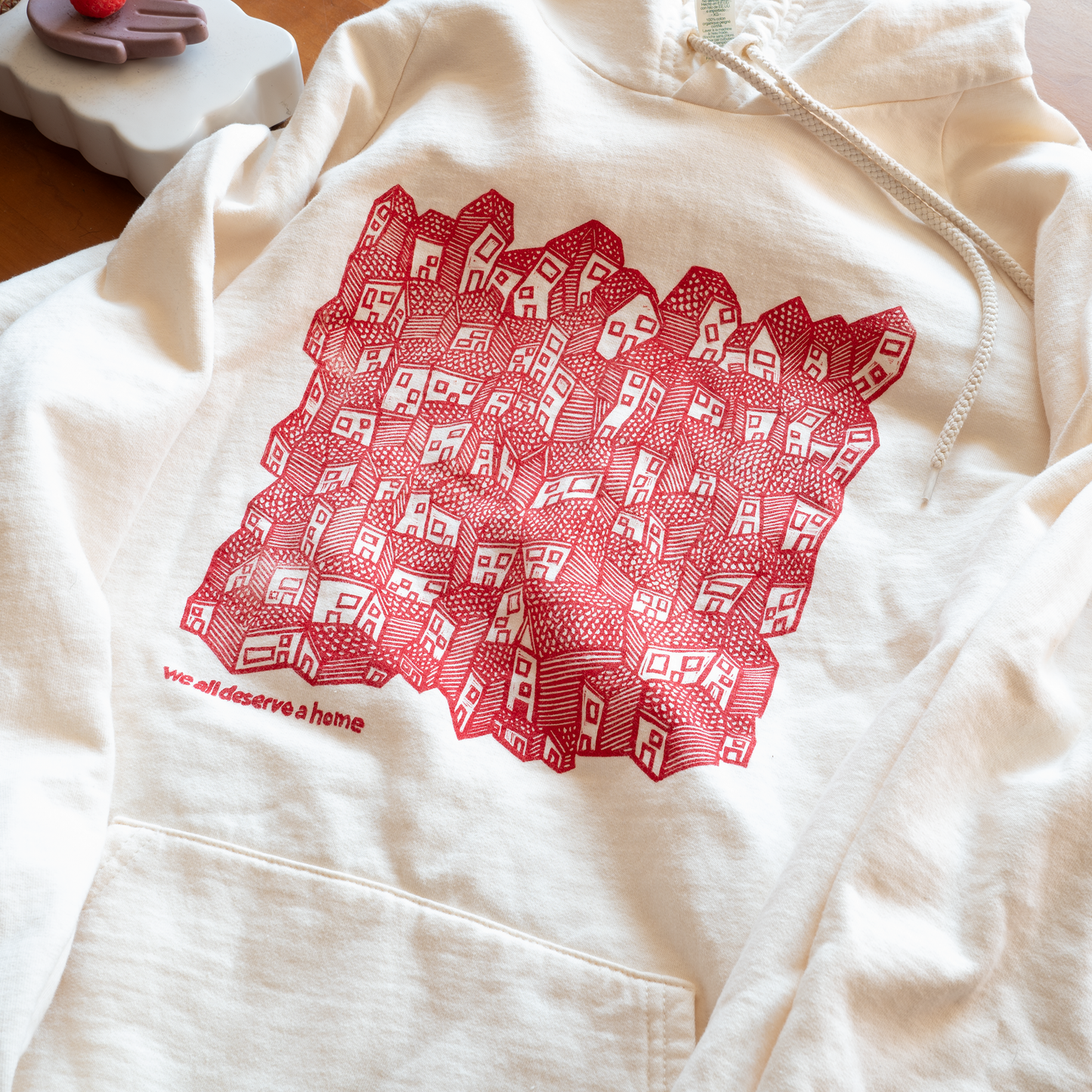 We All Deserve a Home Tagline Hoodie