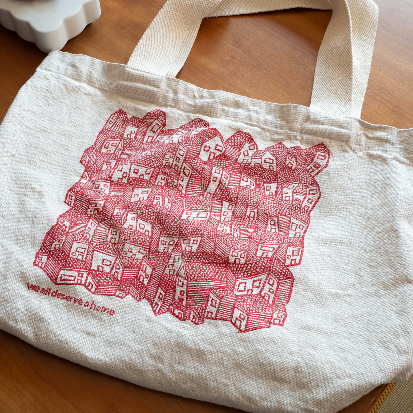 We All Deserve a Home Tote Bag